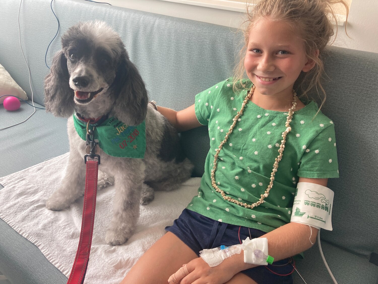 Bryn, 10, with her therapy dog Jack.